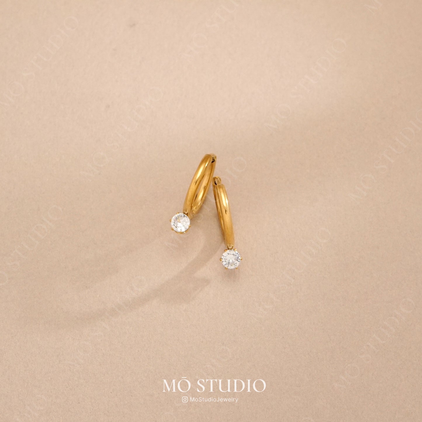 small gold diamond huggie hoop earrings with cz stone