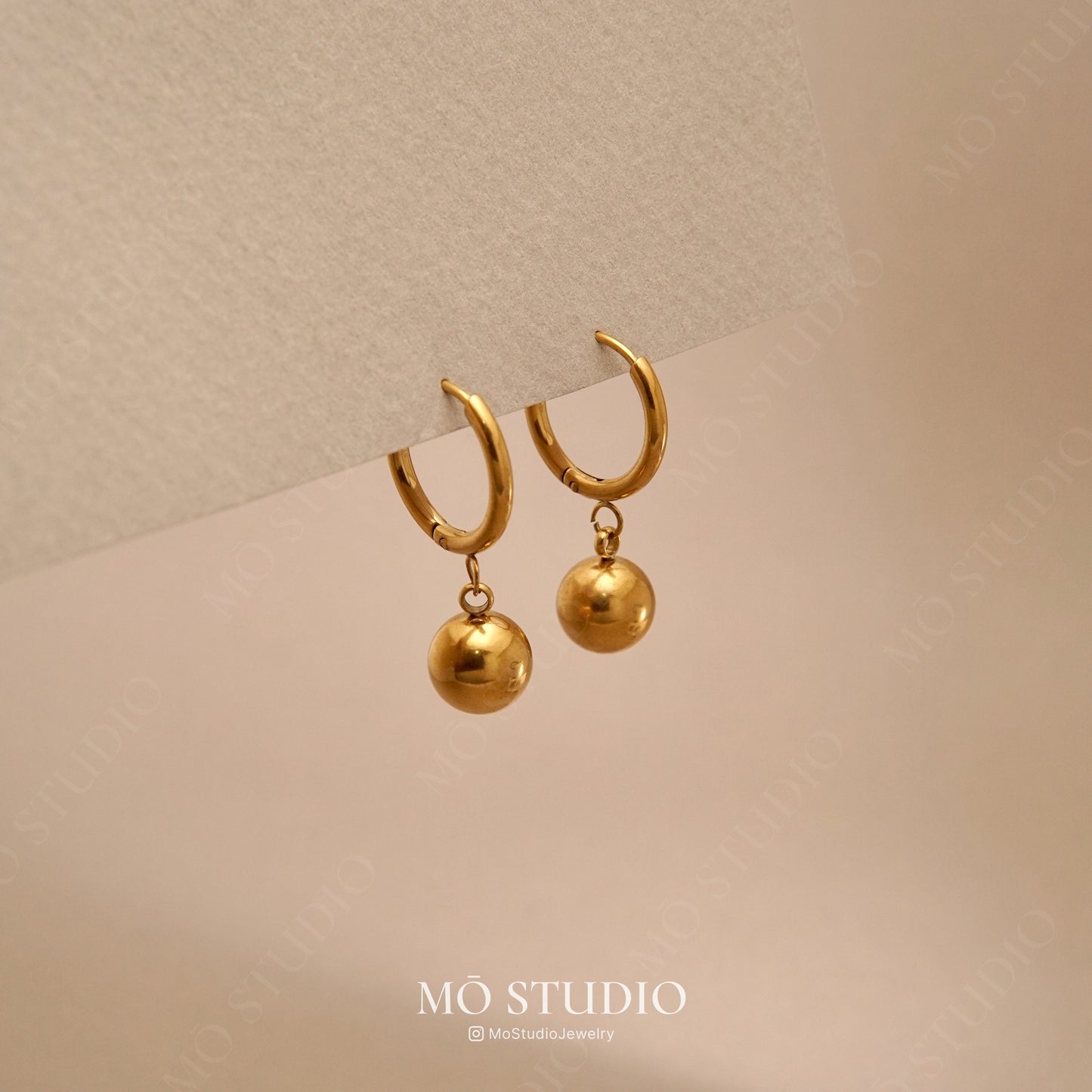 bold gold hoop earrings with ball accent waterproof