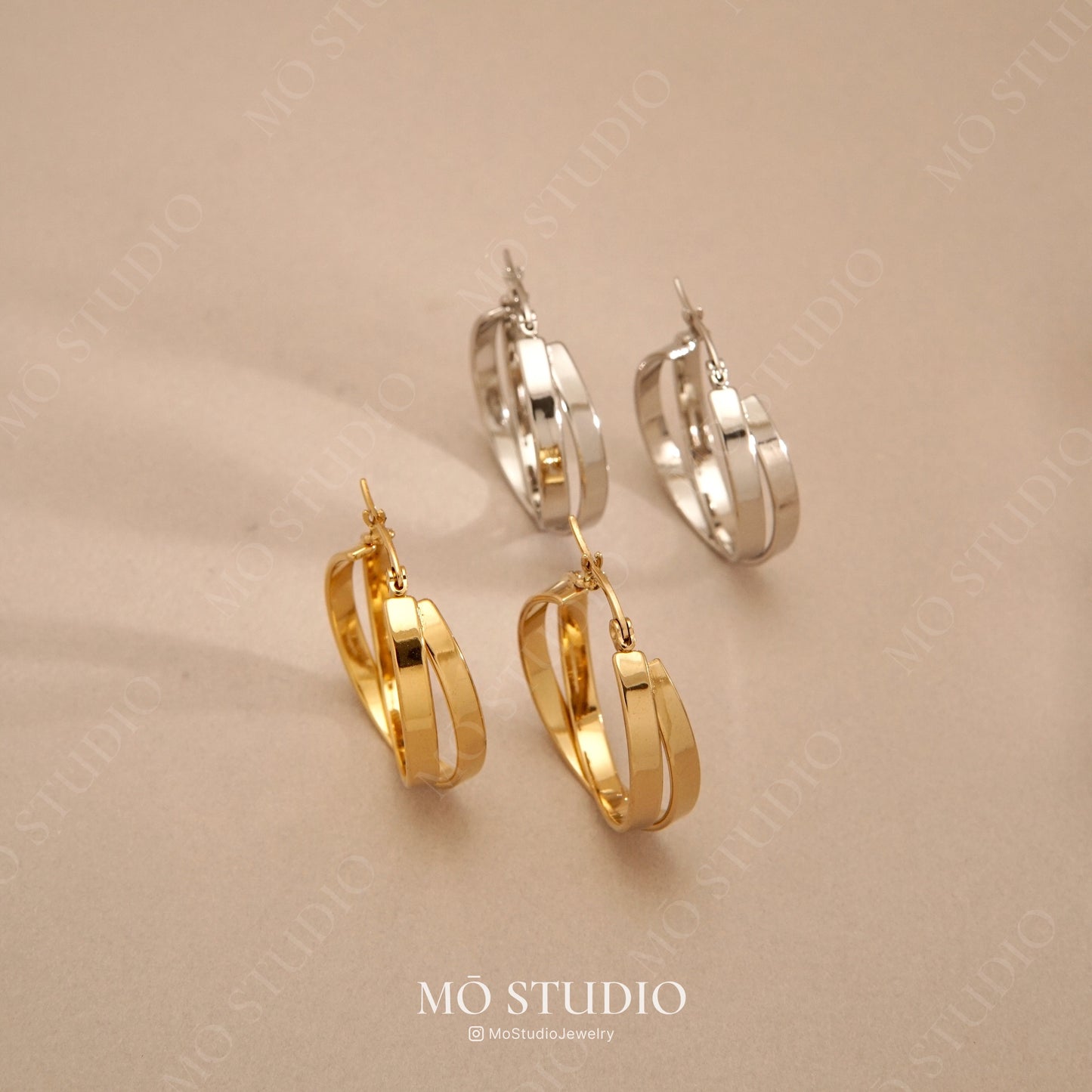 chunky twisted rope hoop earrings in gold and silver