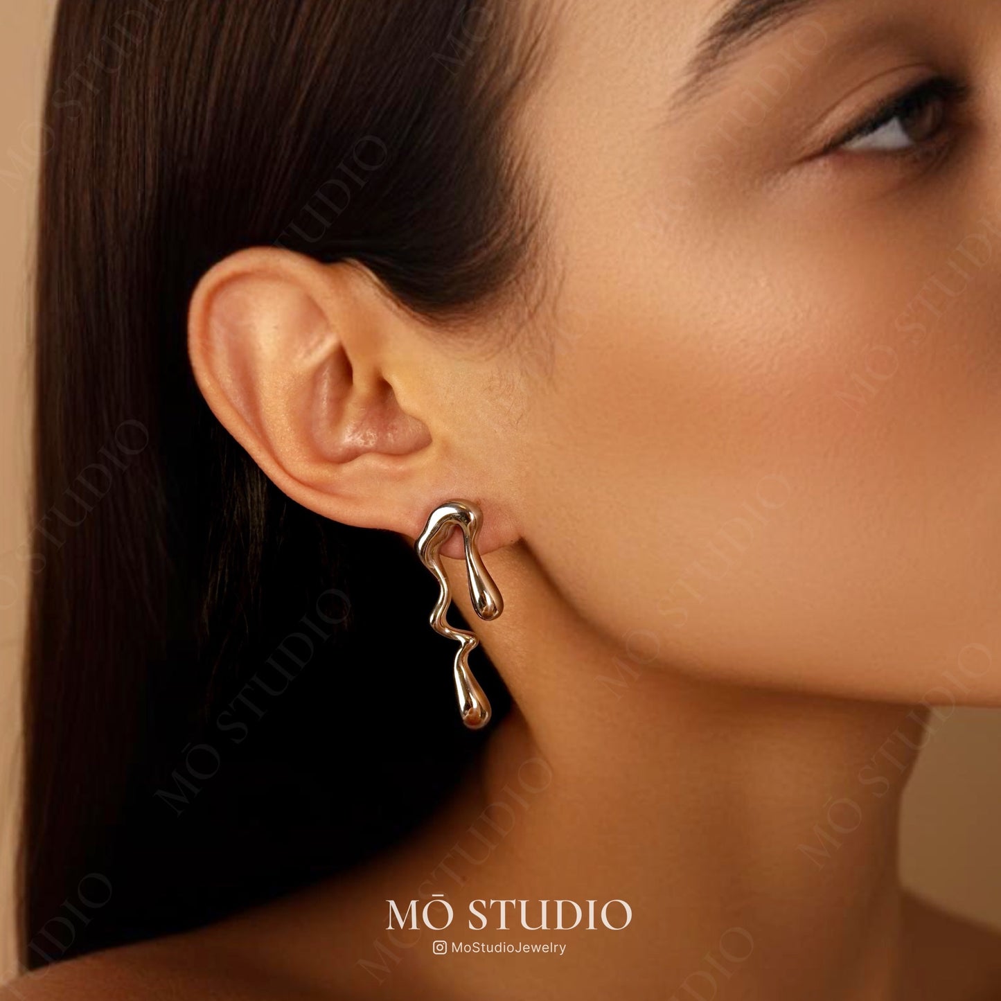 asymmetrical modern silver stud earrings