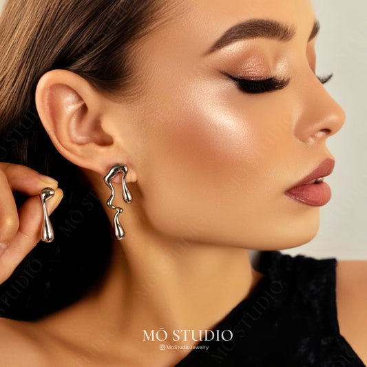 mismatched silver abstract teardrop earrings