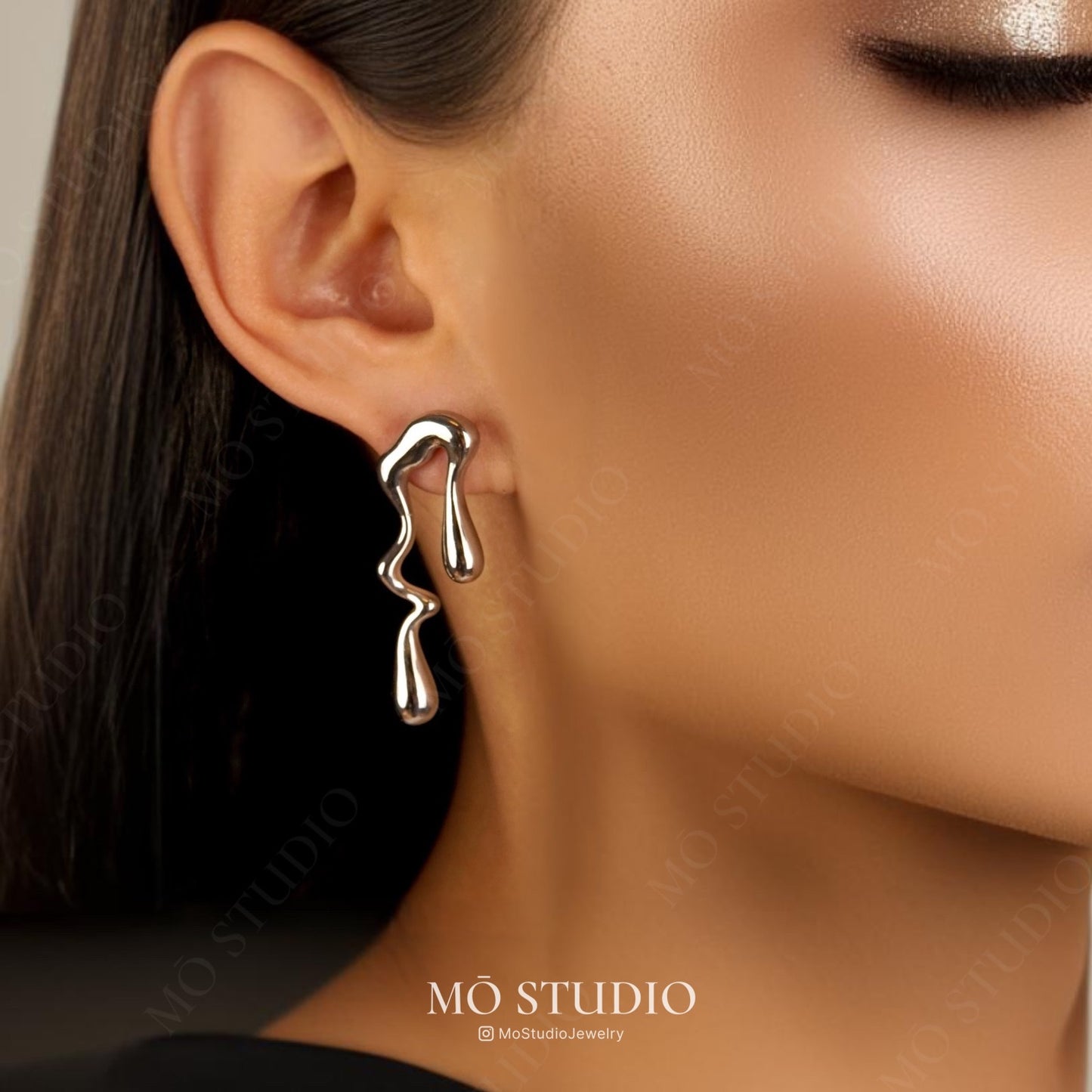 Mismatched Teardrop Earrings – Silver Abstract Studs