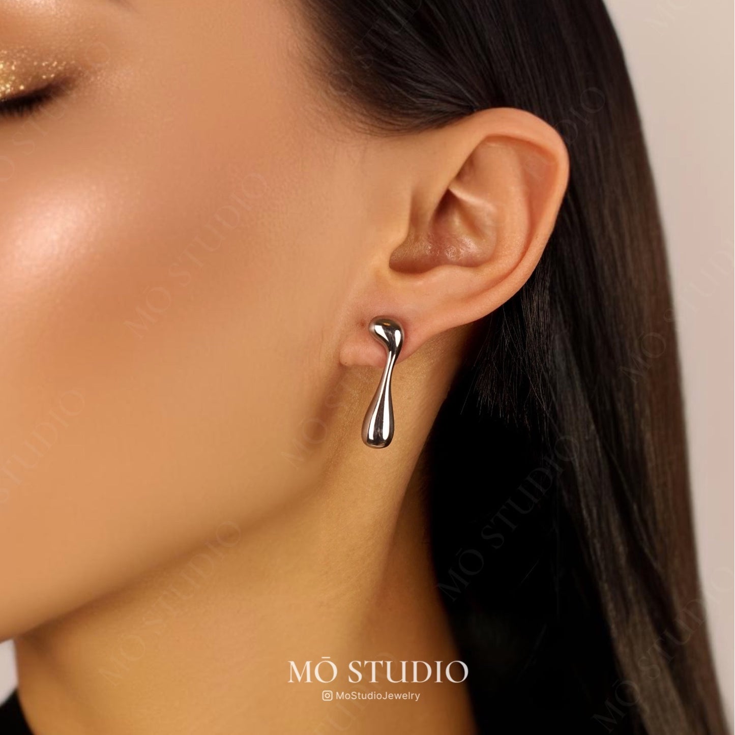 Mismatched Teardrop Earrings – Silver Abstract Studs