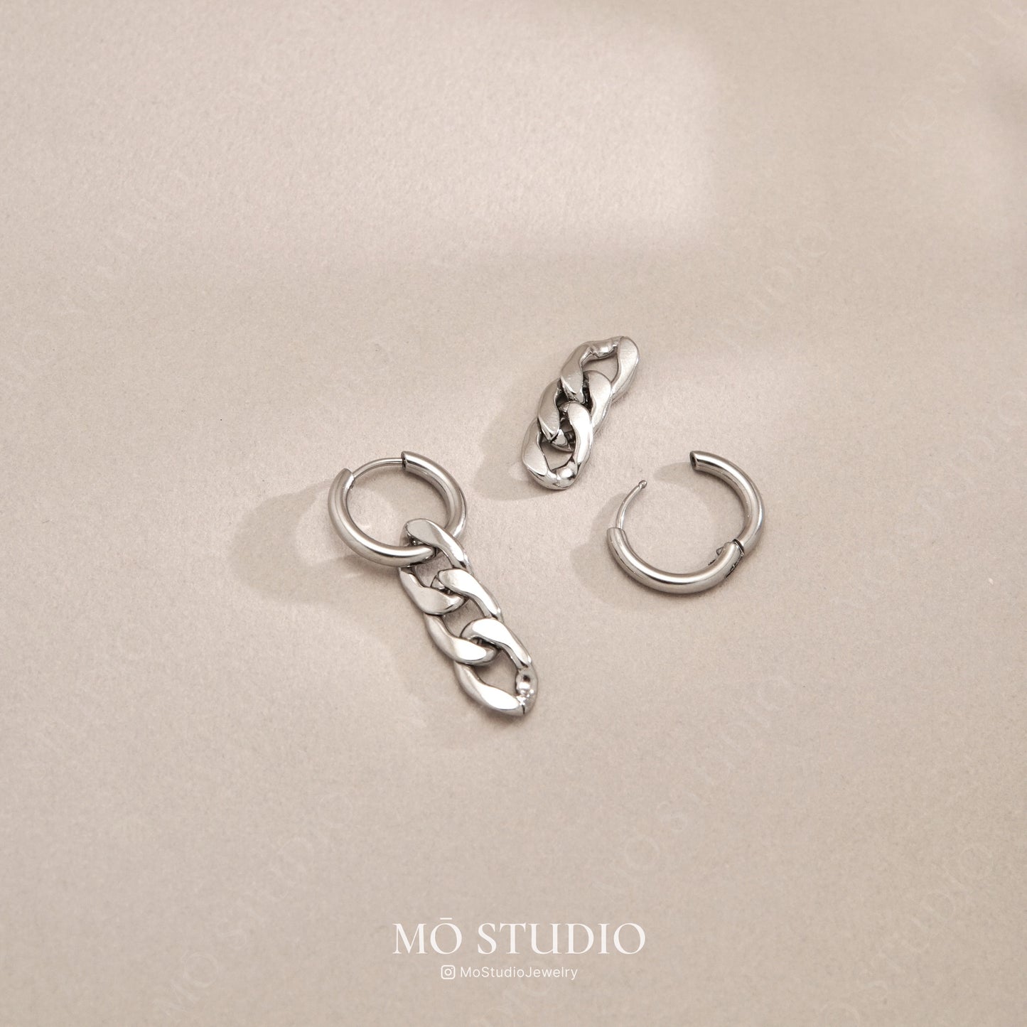 chunky silver chain drop earrings with Cuban links