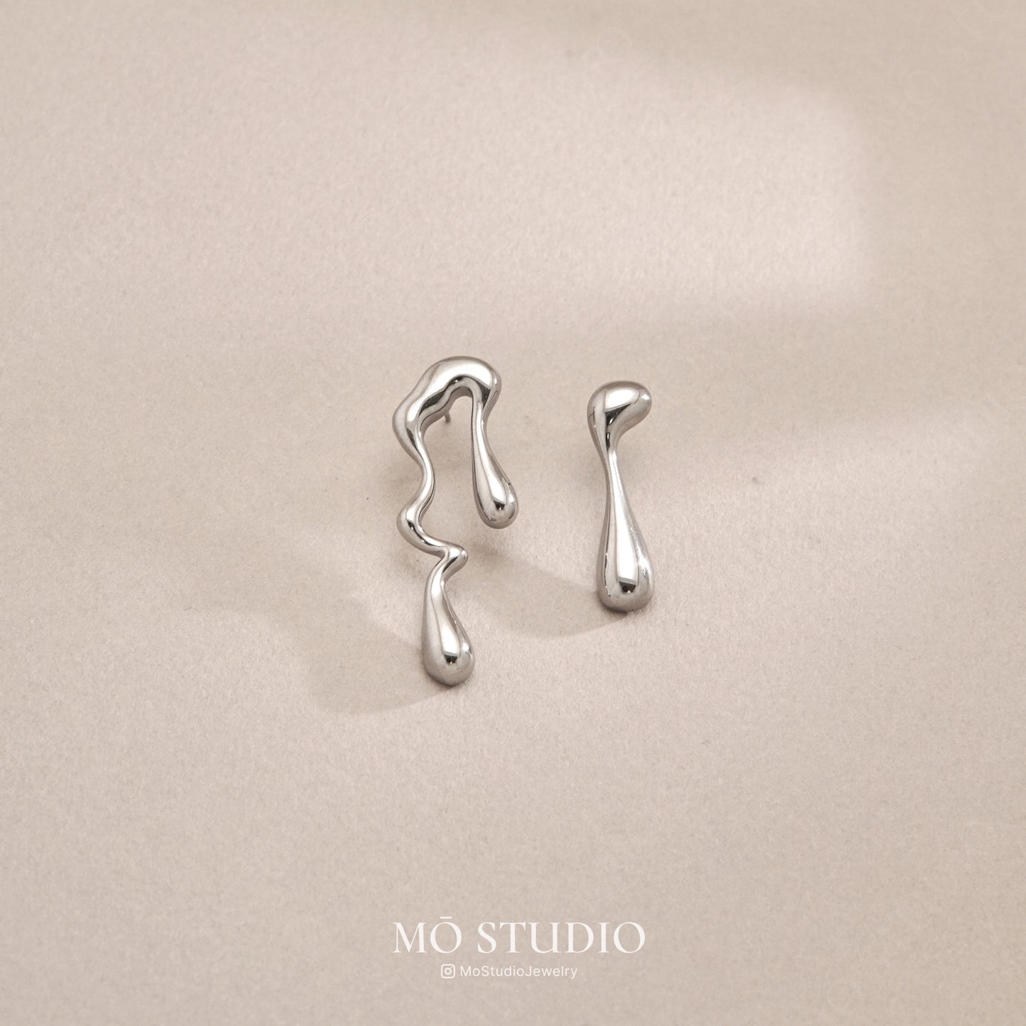 liquid metal inspired geometric earrings