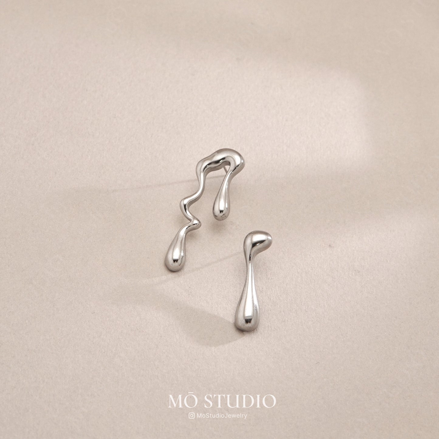 Mismatched Teardrop Earrings – Silver Abstract Studs