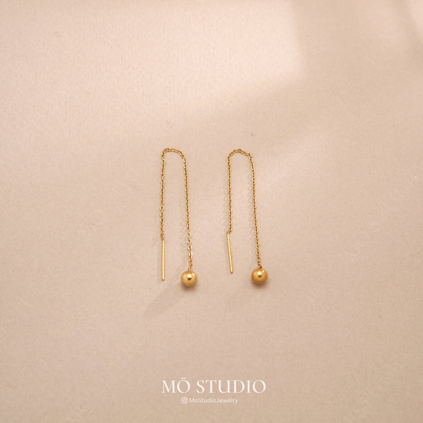 minimalist gold pull through earrings