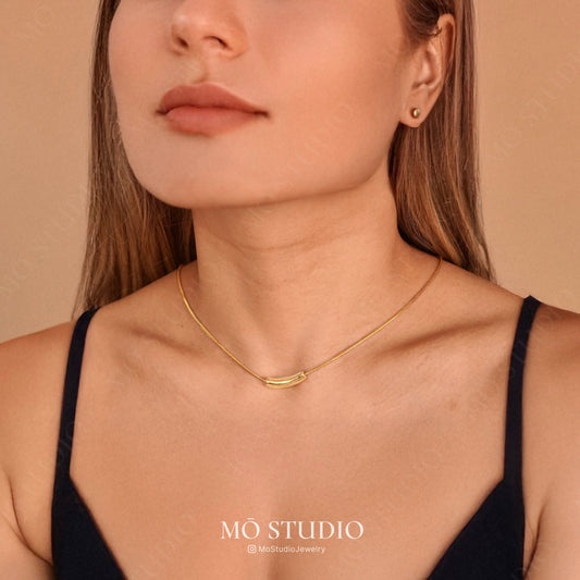 minimalist gold curved bar necklace