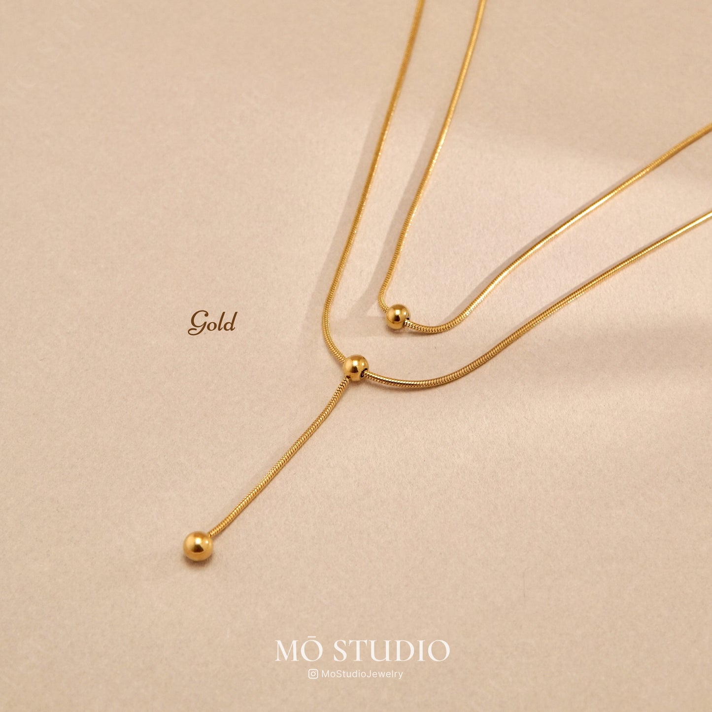 minimalist statement gold necklace