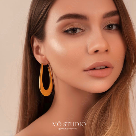 bold minimalist oval hoop earrings modern statement