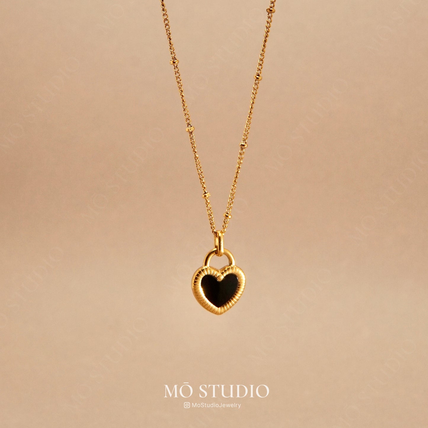 two-sided heart pendant necklace gold