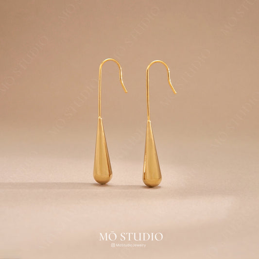 gold teardrop dangle earrings with minimalist drop shape