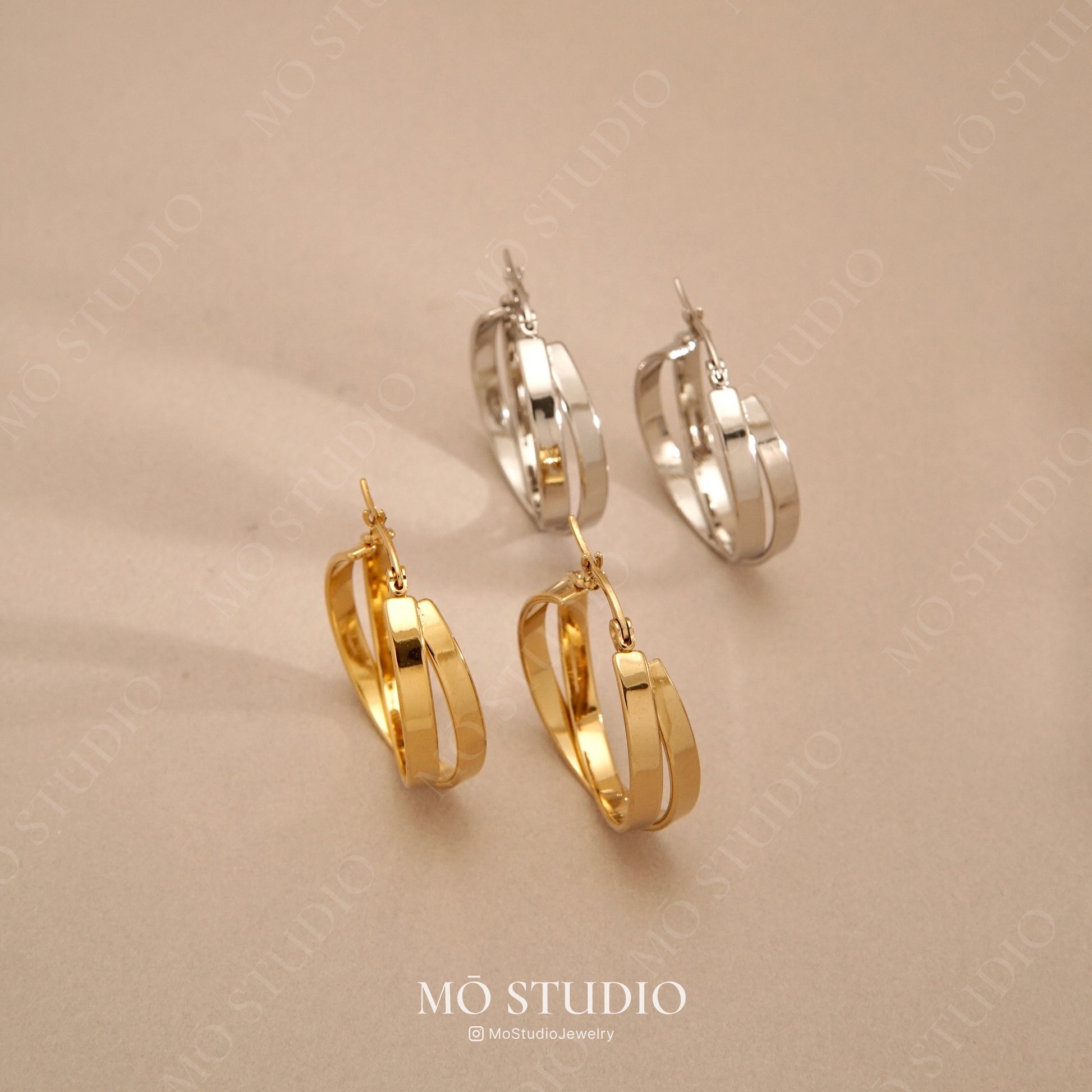 chunky twisted rope hoop earrings in gold and silver