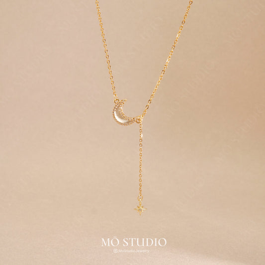 gold moon and star necklace with crystal pendant