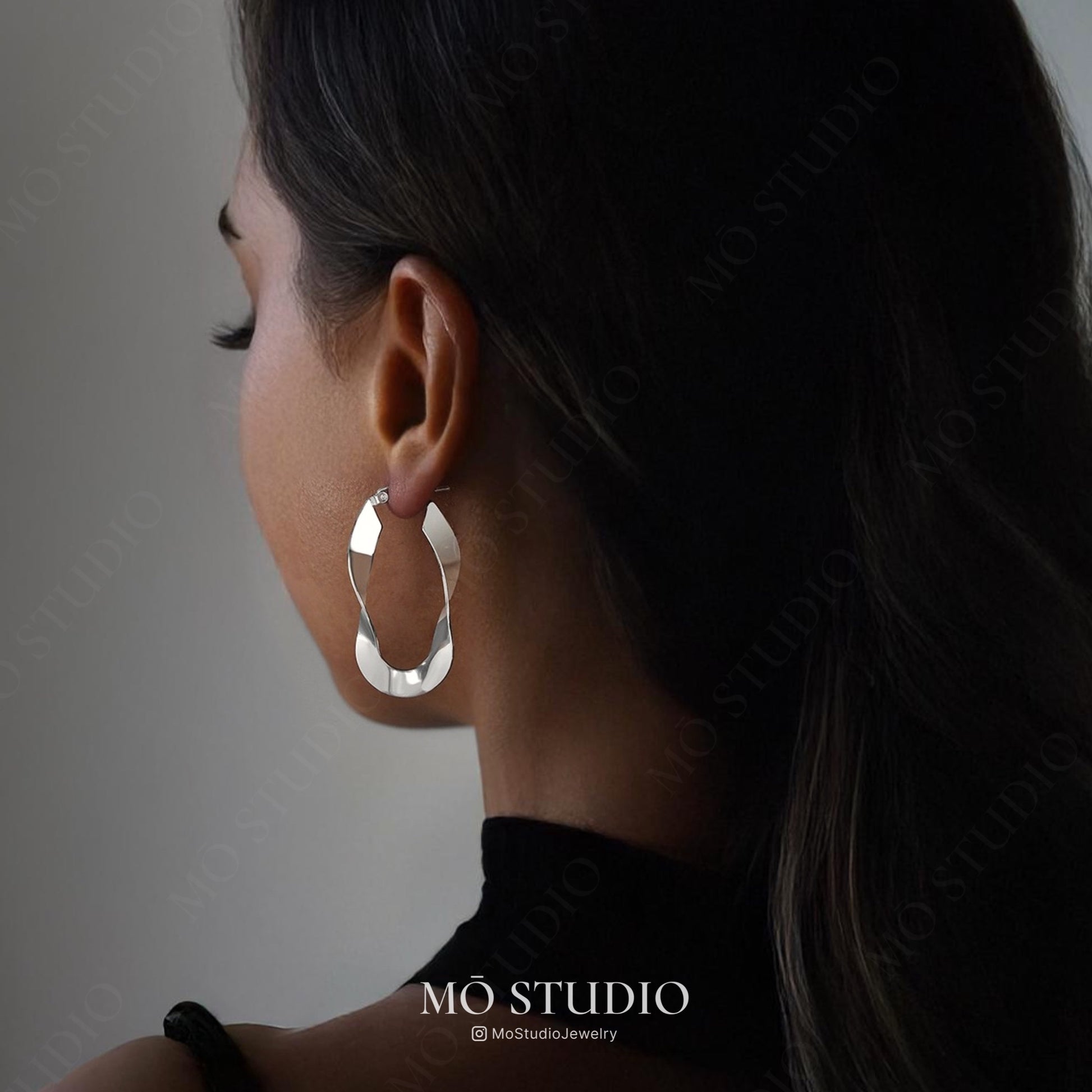 large sculptural twist hoop earrings for statement style