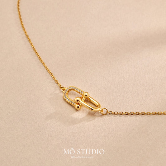 Gold Horseshoe Pendant Necklace