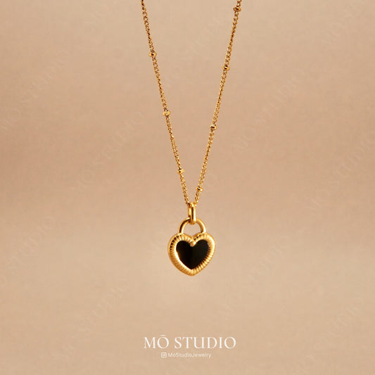 two-sided heart pendant necklace gold